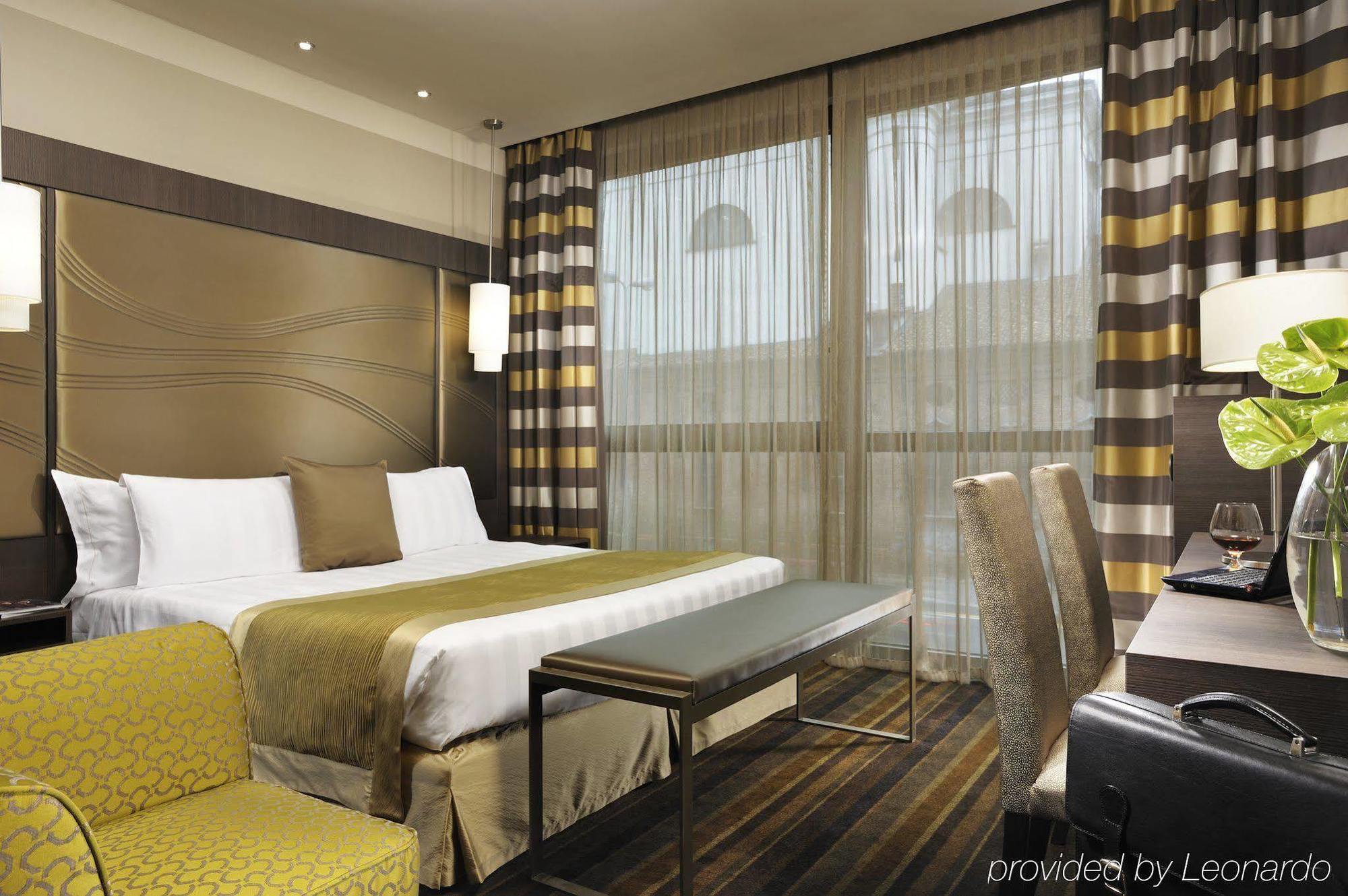 Uptown Palace Milan Room photo